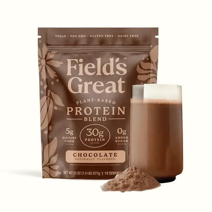 Field's Great plant-based protein blend package with a glass of chocolate protein shake.